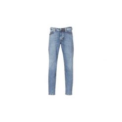Jeansy straight leg Diesel LARKEE BEEX. Niebieskie jeansy męskie marki Diesel. Za 659,00 zł.