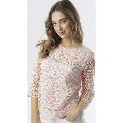 Jasnoróżowa Bluzka Cherilura. Różowe bluzki damskie Born2be, xl, bez wzorów, bez kołnierzyka, bez rękawów. W wyprzedaży za 44,99 zł.