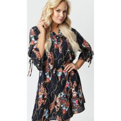 Granatowa Sukienka Aglaolodia. Niebieskie sukienki damskie Born2be, na co dzień, xl, w paski, z falbankami, bez rękawów, mini, trapezowe. Za 69,99 zł.
