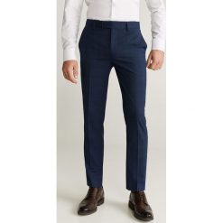 Mango Man - Spodnie. Niebieskie spodnie męskie Mango Man, bez wzorów, z elastanu. Za 199,90 zł.