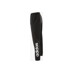 Spodnie Gym & Pilates Linear 100 męskie. Czarne spodnie męskie Adidas, m, bez wzorów, z bawełny. Za 149,99 zł.