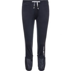Spodnie dresowe Liu Jo Sport T69110 F0787. Niebieskie spodnie damskie Liu Jo Sport, s, z bawełny. W wyprzedaży za 429,00 zł.
