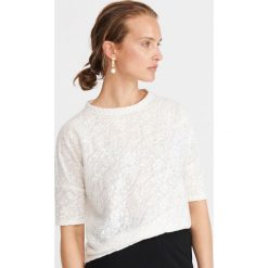 Bluzka ze strukturalnej dzianiny - Kremowy. Białe bluzki damskie Reserved, s, bez wzorów, z dzianiny, bez kołnierzyka, bez rękawów. W wyprzedaży za 19,99 zł.