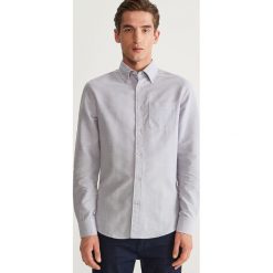 Koszula slim fit z bawełny organicznej - Niebieski. Niebieskie koszule męskie slim marki Reserved, s, z bawełny. Za 69,99 zł.