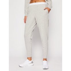 Spodnie dresowe Calvin Klein Underwear 000QS6429E. Szare spodnie damskie Calvin Klein Underwear, s, z dresówki. Za 229,00 zł.