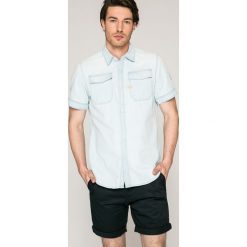 G-Star Raw - Koszula. Niebieskie koszule męskie G-Star RAW, xl, bez wzorów, z bawełny, klasyczne, z klasycznym kołnierzykiem, z krótkim rękawem. W wyprzedaży za 139,90 zł.