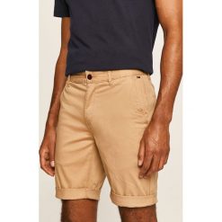 Tommy Jeans - Szorty. Czarne spodenki i szorty męskie Tommy Jeans, bez wzorów, z elastanu, casualowe. Za 299,90 zł.
