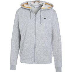 Lacoste Sport WOMEN TENNIS Bluza rozpinana light grey. Szare bluzy damskie Lacoste Sport, z bawełny. Za 409,00 zł.