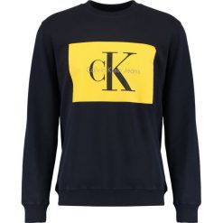 Calvin Klein Jeans HOTORO REGULAR FIT Bluza night sky. Niebieskie kardigany męskie Calvin Klein Jeans, xl, bez wzorów, z bawełny, bez kołnierzyka, bez rękawów, bez kaptura. W wyprzedaży za 359,20 zł.