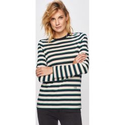 Tommy Hilfiger - Longsleeve. Czerwone bluzki damskie TOMMY HILFIGER, s, bez wzorów, z lyocellu, z okrągłym kołnierzem. W wyprzedaży za 179,90 zł.