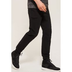 Spodnie typu jogger - Czarny. Czarne spodnie damskie House, s, bez wzorów. Za 99,99 zł.