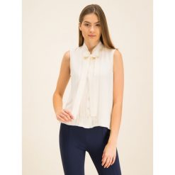 Top Tory Burch Bow 62160. Brązowe bluzki damskie Tory Burch, bez wzorów, z jedwabiu, polo, bez rękawów. W wyprzedaży za 829,00 zł.