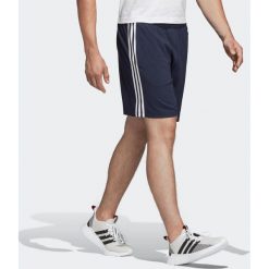 Spodenki fitness cardio męskie. Niebieskie spodenki sportowe męskie Adidas, s, bez wzorów, z poliesteru, na fitness i siłownię. Za 119,99 zł.