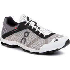 Buty ON - Cloudrush 170000 Black/White. Czarne buty sportowe męskie On, z tworzywa sztucznego, bez zapięcia, do biegania. W wyprzedaży za 509,00 zł.