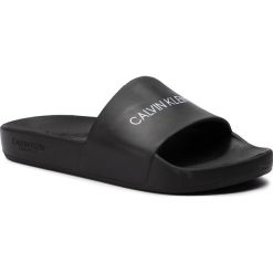 Klapki CALVIN KLEIN - Slide KW0KW00778 Pvh Black BEH. Czarne klapki damskie Calvin Klein, bez wzorów, z tworzywa sztucznego, bez obcasa. Za 179,00 zł.