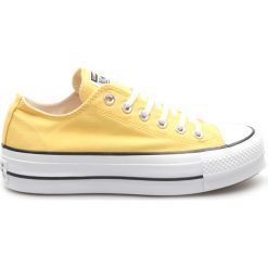 Converse Chuck Taylor All Star Tenisówki Żółty. Żółte trampki i tenisówki damskie Converse, bez wzorów, z materiału, bez zapięcia. Za 264,95 zł.