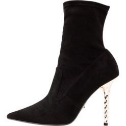 Dune London OZANA Botki na obcasie black. Czarne botki damskie marki Dune London, ze skóry ekologicznej, bez obcasa, na obcasie, bez zapięcia. Za 799,00 zł.