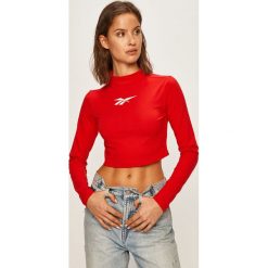 Reebok Classic - Longsleeve. Czerwone topy damskie Reebok Classic, s, z nadrukiem, z elastanu, z golfem. W wyprzedaży za 89,90 zł.
