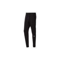 Spodnie treningowe Reebok Sport Spodnie Workout Ready Fleece. Czarne spodnie męskie Reebok Sport, s, bez wzorów, sportowe. Za 179,00 zł.
