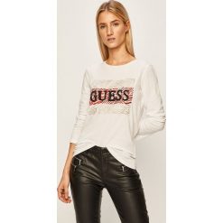Guess Jeans - Longsleeve. Białe bluzki damskie Guess Jeans, s, z aplikacjami, z bawełny, casualowe, z okrągłym kołnierzem. Za 229,90 zł.
