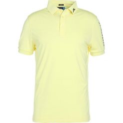 Koszulki sportowe męskie: J.LINDEBERG TOUR TECH SLIM Koszulka sportowa still yellow