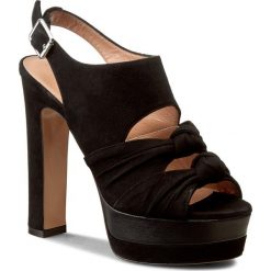 Sandały TWINSET - Scarpa CS7PF1 Nero 00006. Czarne klapki damskie marki Twinset, w paski, ze skóry, bez obcasa, na obcasie. W wyprzedaży za 659,00 zł.