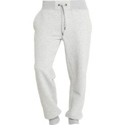 Peak Performance LOGO PANT Spodnie materiałowe medium grey melange. Szare spodnie męskie marki Peak Performance, xxl, bez wzorów, z bawełny, sportowe, długie. Za 479,00 zł.