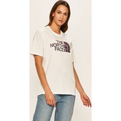The North Face - T-shirt. Białe bluzki damskie The North Face, s, z nadrukiem, z bawełny, casualowe, z okrągłym kołnierzem, z krótkim rękawem. Za 119,90 zł.