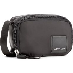 Torebka CALVIN KLEIN - Fluid Small Cossbody K60K603804 001. Czarne listonoszki damskie marki Calvin Klein, z materiału. W wyprzedaży za 249,00 zł.
