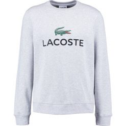 Lacoste Bluza hellgrau meliert. Szare kardigany męskie marki Lacoste, m, z bawełny. W wyprzedaży za 375,20 zł.