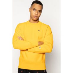 Bluza Champion Crewneck 214676. Żółte bluzy męskie Champion, xl, bez wzorów, z bawełny, bez kołnierzyka, bez rękawów, bez kaptura. W wyprzedaży za 269,00 zł.