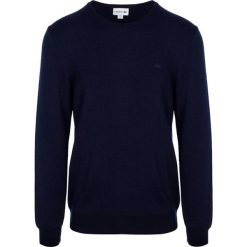 Sweter w kolorze granatowym. Niebieskie swetry męskie Lacoste, s, bez wzorów, z wełny, klasyczne, z okrągłym kołnierzem, bez kaptura. W wyprzedaży za 319,95 zł.