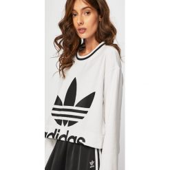Adidas Originals - Bluza. Białe bluzy damskie adidas Originals, z nadrukiem, z bawełny, bez rękawów, bez kaptura. Za 229,90 zł.