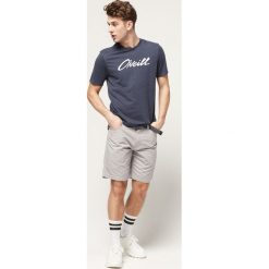 O'Neill Szorty Szary. Szare spodenki i szorty męskie O'Neill, w paski, z bawełny. Za 274,95 zł.