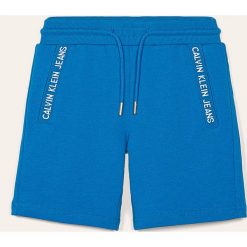 Calvin Klein Jeans - Szorty dziecięce 116-176 cm. Czarne spodenki chłopięce z bawełny, sportowe. Za 249,90 zł.