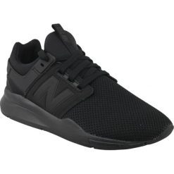 Czarne Buty New Balance W KL247TMG. Czarne buty sportowe damskie New Balance, bez wzorów, z materiału, sportowe. W wyprzedaży za 289,00 zł.