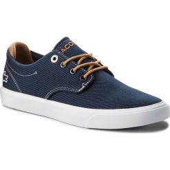 Tenisówki LACOSTE - Esparre 218 1 Caj 7-35CAJ0004NT9 Nvy/Lt Tan. Niebieskie półbuty damskie Lacoste, na co dzień, bez wzorów, z gumy, bez obcasa, na płaskiej podeszwie, bez zapięcia. W wyprzedaży za 189,00 zł.