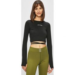 Gym Hero - Bluzka Hero Girl. Czarne topy damskie Gym Hero, s, z nadrukiem, z elastanu, z okrągłym kołnierzem. W wyprzedaży za 89,90 zł.