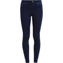 Cheap Monday Spray Jeans Skinny Fit solid blue. Niebieskie jeansy damskie relaxed fit marki Cheap Monday, z bawełny. W wyprzedaży za 146,30 zł.