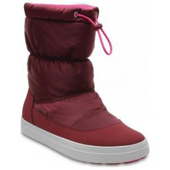 Crocs Śniegowce Lodgepoint Shiny Pullon W Garnet/Candy Pink 38,5. Różowe buty sportowe damskie marki Crocs, bez wzorów, ze skóry, na wysokim obcasie. W wyprzedaży za 249,00 zł.