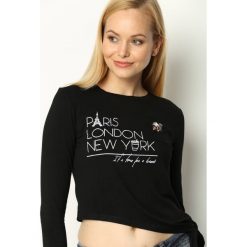 Czarna Bluzka Triangle. Czarne bluzki damskie Born2be, xl, z nadrukiem, z okrągłym kołnierzem, z długim rękawem. Za 39,99 zł.