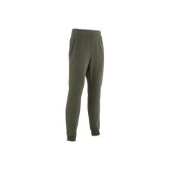 Spodnie dresowe slim Gym & Pilates 500 zip męskie. Szare spodnie męskie marki DOMYOS, xs, bez wzorów, z elastanu. Za 69,99 zł.
