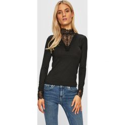 Jacqueline de Yong - Bluzka. Czarne bluzki damskie Jacqueline de Yong, s, bez wzorów, z elastanu, z golfem, bez rękawów. W wyprzedaży za 79,90 zł.