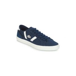 Buty Lacoste SIDELINE 119 1. Niebieskie trampki męskie Lacoste, bez wzorów, bez zapięcia. Za 303,20 zł.