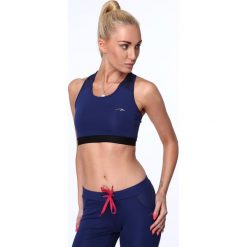 Top sportowy z gumą granatowy MR13300. Niebieskie topy sportowe damskie marki Fasardi, s, z gumy. Za 39,00 zł.