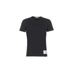 T-shirty z krótkim rękawem Calvin Klein Jeans TAKODA SLIM. Czarne t-shirty męskie Calvin Klein Jeans, s, bez wzorów, z jeansu, bez kołnierzyka, krótkie. Za 122,52 zł.