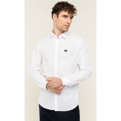 Koszula Armani Exchange 6GZCG7 ZNBJZ 1100. Białe koszule męskie Armani Exchange, m, bez wzorów, z bawełny, casualowe, bez kołnierzyka, bez rękawów. W wyprzedaży za 199,00 zł.