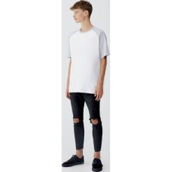 Jeansy super skinny fit z przetarciami. Szare jeansy męskie relaxed fit Pull&Bear, z jeansu. Za 129,00 zł.