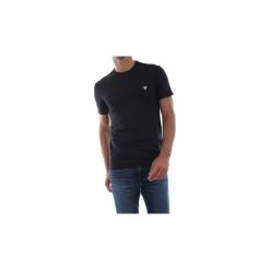 T-shirty z krótkim rękawem Guess M94I24 J1300 CORE TEE. Czarne t-shirty męskie Guess, s, z aplikacjami, bez kołnierzyka, krótkie. Za 106,12 zł.