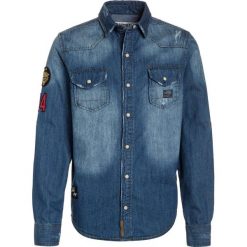 Kaporal RENIM Koszula blue denim. Niebieskie koszule chłopięce marki Kaporal, z bawełny. Za 249,00 zł.